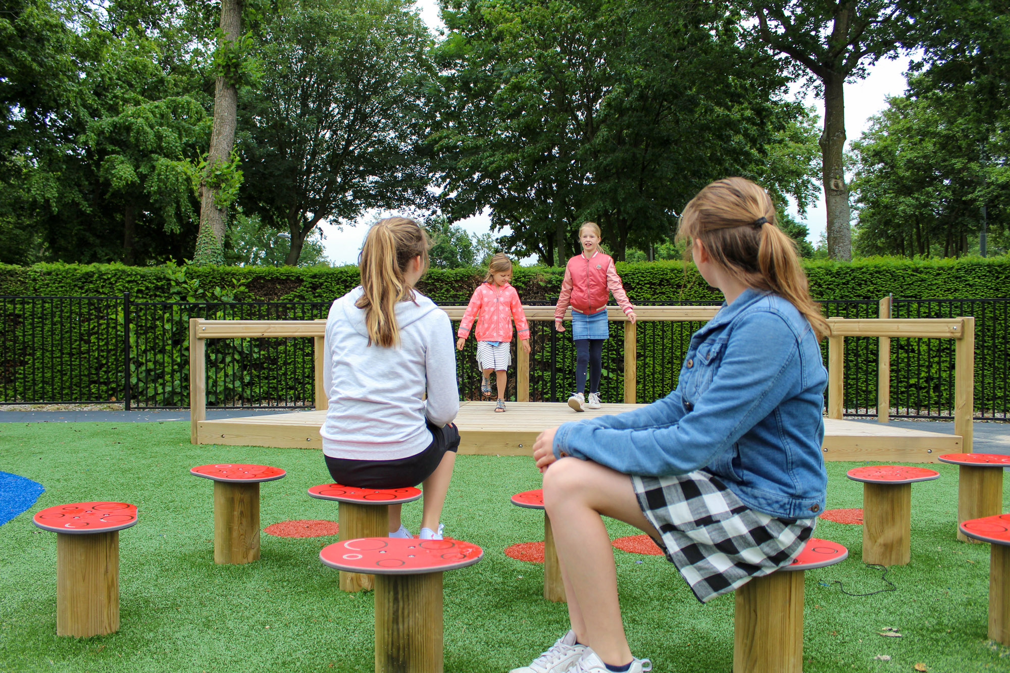 main-stage-with-posts-and-rails-toadstools-park-grass-.jpg